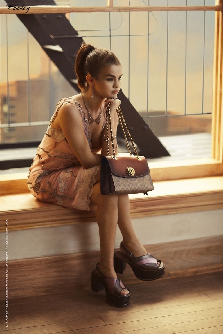 Selena Gomez Poses On A ledge In Her Latest Coach Campaign!
